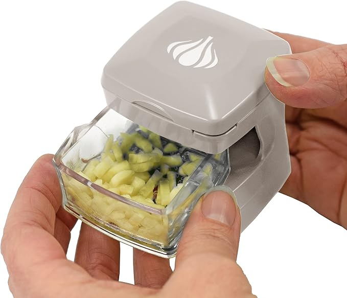 Kitchen Innovations Garlic-A-Peel Garlic Press, Crusher, Cutter, Mincer, and Storage Container - Includes Silicone Garlic Peeler - Easy to Clean - Stainless Steel Blades – (Cream), standard