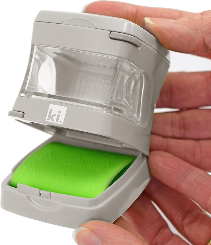 Kitchen Innovations Garlic-A-Peel Garlic Press, Crusher, Cutter, Mincer, and Storage Container - Includes Silicone Garlic Peeler - Easy to Clean - Stainless Steel Blades – (Cream), standard