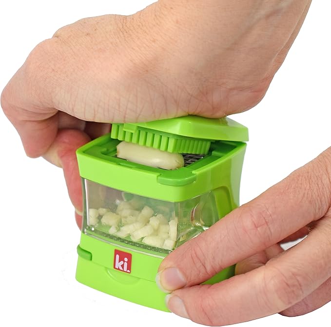 Kitchen Innovations Garlic-A-Peel Garlic Press, Crusher, Cutter, Mincer, and Storage Container - Includes Silicone Garlic Peeler - Easy to Clean - Stainless Steel Blades – (Green), standard